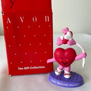 Avon love takes me higher figurine!!!